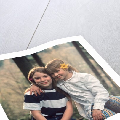 two Young Girls With Flowers In Their Hair Sitting Outside Retro 1970 1970s by Anonymous