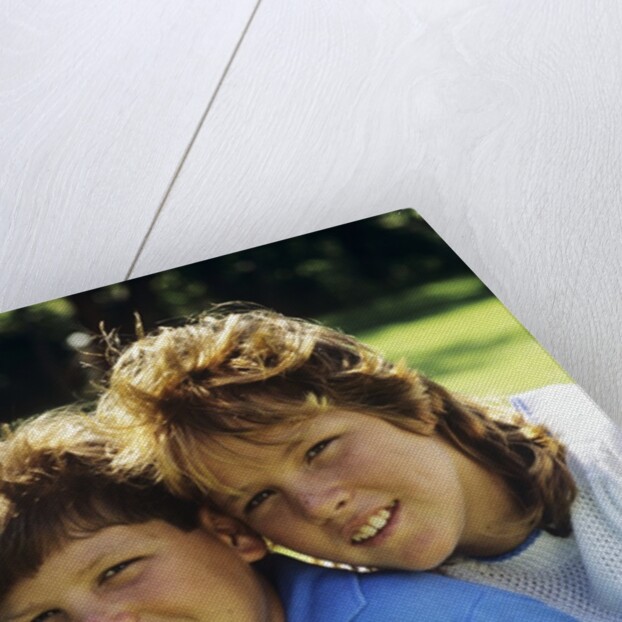 1980s Two Brothers And Their Sister Posed Heads Together Smiling Looking At Camera by Anonymous