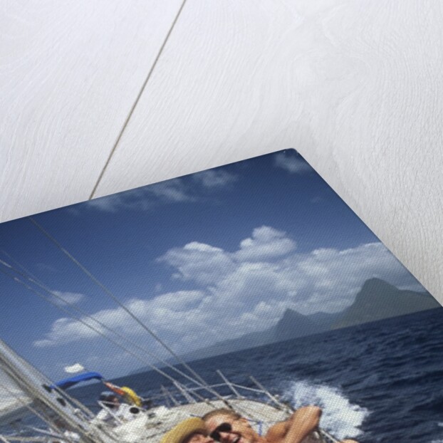 1990s Couple Sitting On Bow Of Sailboat Saint Lucia West Indies by Anonymous
