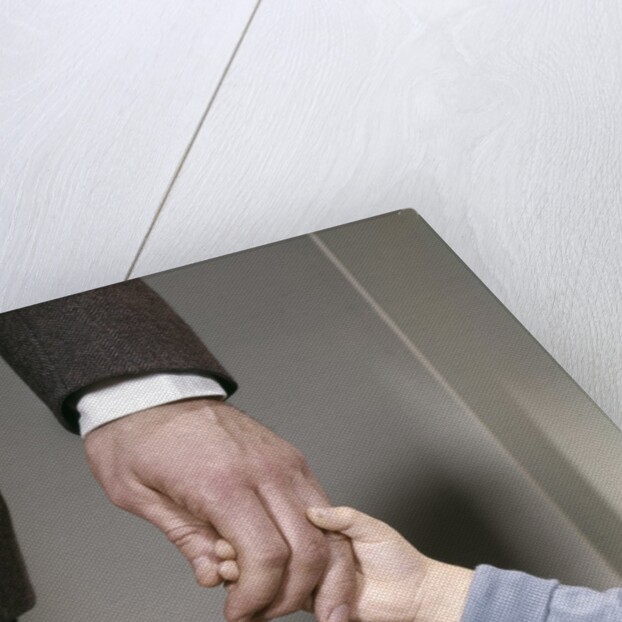 1960s Adult Man Hand Holding That Of Small Child Toddler Father Young Old Safety Protection Guidance Retro by Anonymous