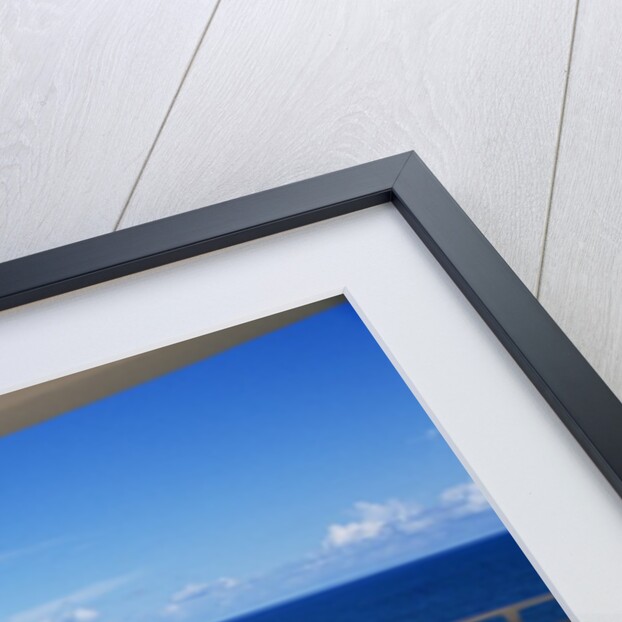 1990s Man In Dark Suit And Tie And Woman In White One Piece Bathing Suit Standing Together On Ocean Side Sun Deck by Anonymous