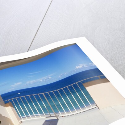 1990s Man In Dark Suit And Tie And Woman In White One Piece Bathing Suit Standing Together On Ocean Side Sun Deck by Anonymous