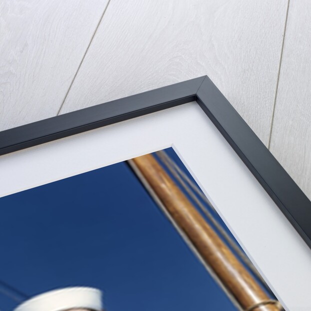 1940s Smiling Woman Wearing Nautical Sailor Outfit And Hat Sitting On Edge Of Boat Holding Paint Brush by Anonymous