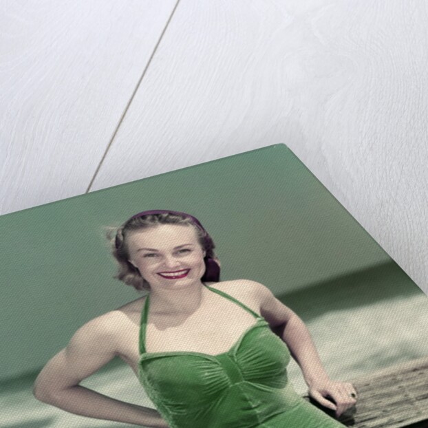 1940s Portrait Smiling Woman Wearing Green Velvet Bathing Suit Posing Leaning On Diving Board by Anonymous