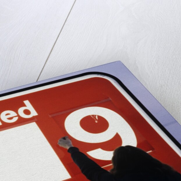 1980s Anonymous Unidentified Person Changing Gasoline Prices Sign by Anonymous