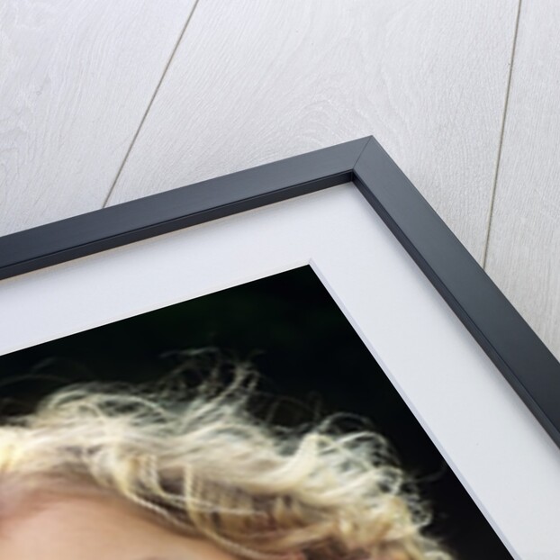 1990s Portrait Of Mother And Daughter Outdoors Looking At Camera Wearing Pink Shirts by Anonymous