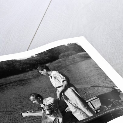 1930s Man Father Teenage Boy Son Dog In Row Boat Fishing In Pond by Anonymous
