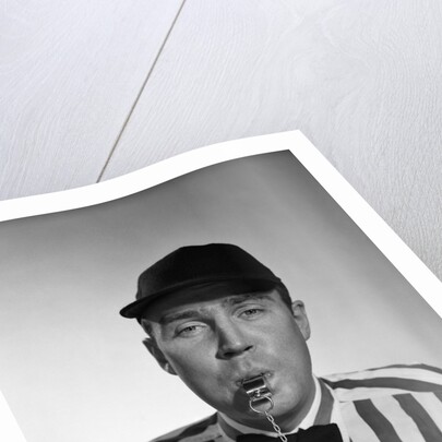 1950s Football Referee Blowing Whistle Looking At Camera by Anonymous