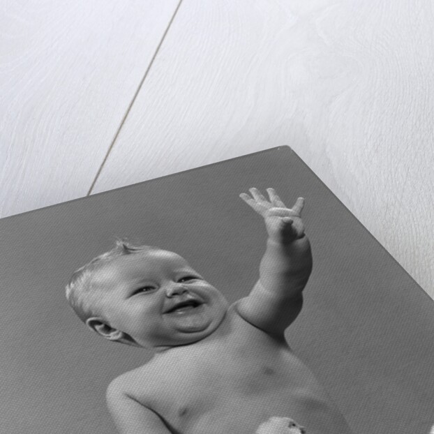 1950s Laughing Waving Baby Surrounded By Little Baby Chicks by Anonymous
