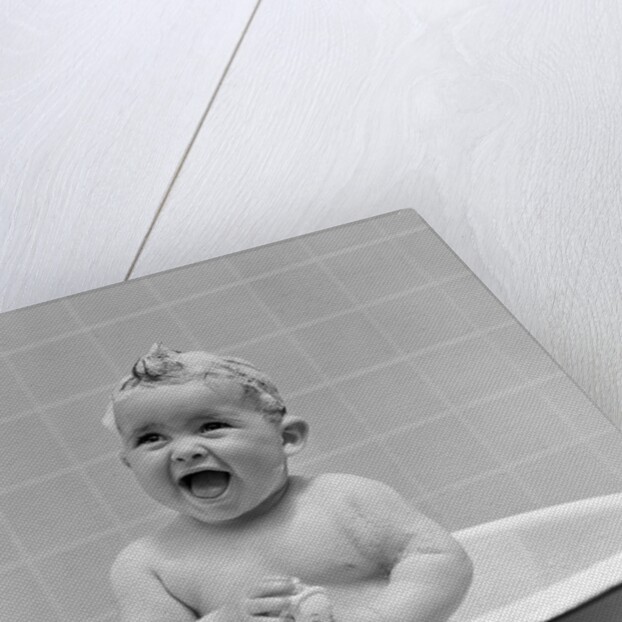 1940s Smiling Baby In Bath Covered In Soap Suds Laughing Holding Toy by Anonymous