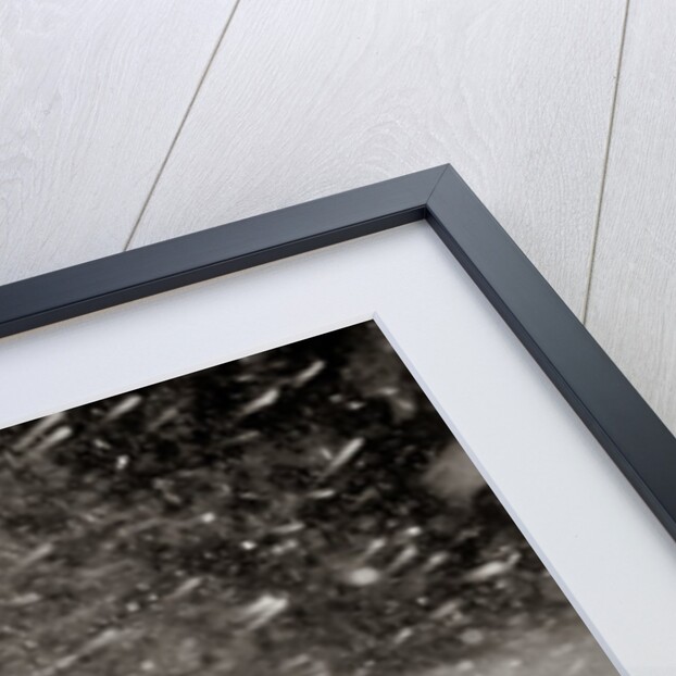 1950s Snow Covered Automobile Driving On Road In Deepening Winter Blizzard Snow by Anonymous