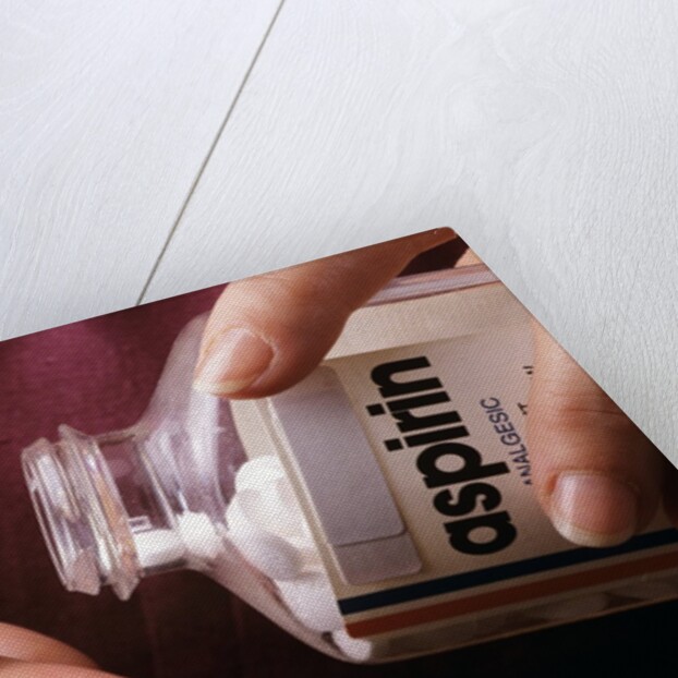 1990s Female Hand Taking Two Aspirin Tablets From Bottle by Anonymous