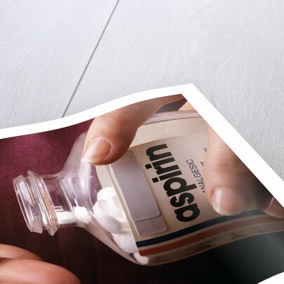 1990s Female Hand Taking Two Aspirin Tablets From Bottle by Anonymous