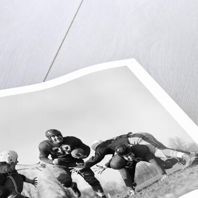 1940s 1950s Five Young Men Wearing Leather Helmets And Uniforms Playing Football by Anonymous