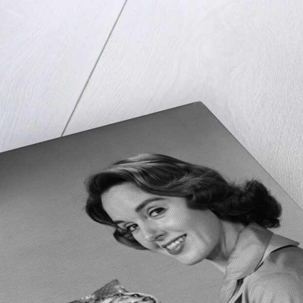 1950s 1960s Smiling Woman Holding Freshly Baked Pie Looking At Camera by Anonymous