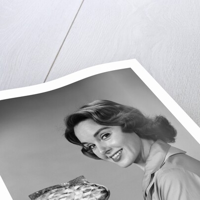 1950s 1960s Smiling Woman Holding Freshly Baked Pie Looking At Camera by Anonymous