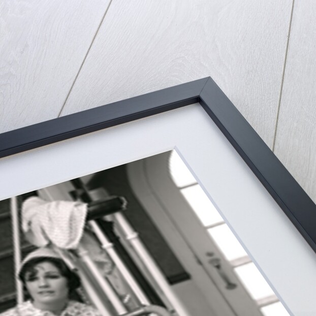 1960s 1970s Exhausted Housewife Sitting At Bottom Of Stairs Surrounded By House Cleaning Equipment by Anonymous