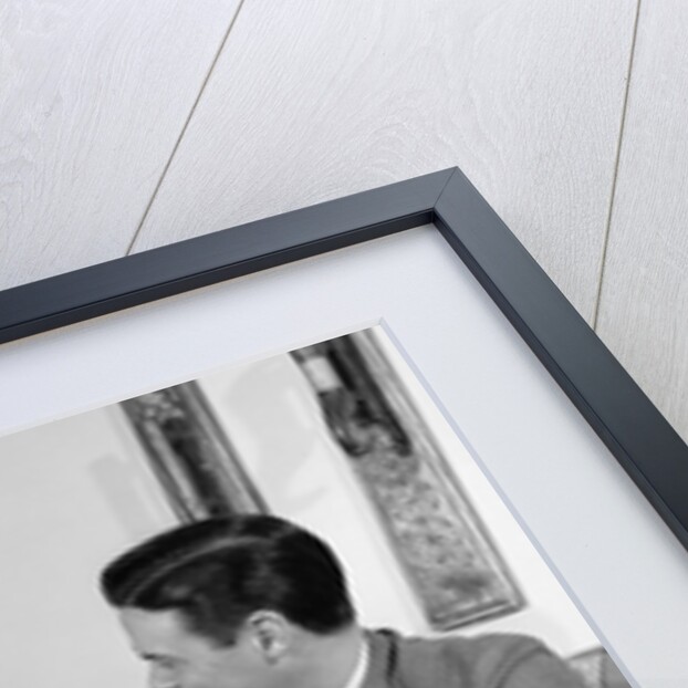 1960s Boy Sitting On Couch Smiling Laughing Talking With Dad by Anonymous