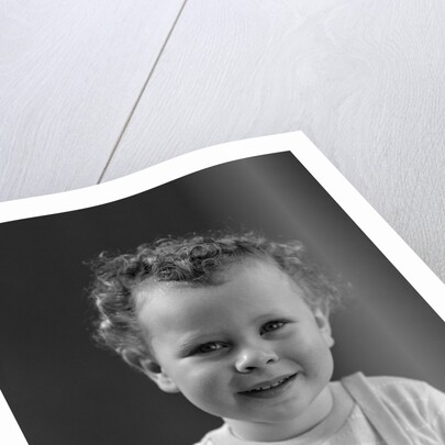 1940s Curly Haired Little Boy Portrait Smiling Looking At Camera by Anonymous