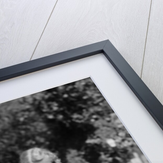 1950s Little Boy Playing Gas Station Pouring Water Into Toy Car For Little Girl by Anonymous