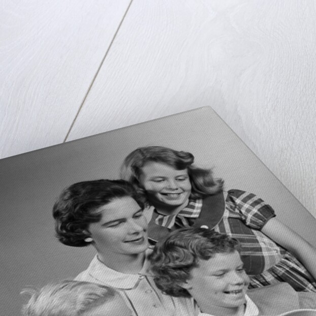1950s Portrait Mother Two Daughters And Son Reading Book Together by Anonymous