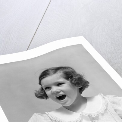 1930s Little Brunette Girl Singing Holding Songbook by Anonymous