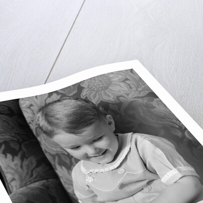 1930s 1940s Little Boy Sitting On Chair Reading Picture Book by Anonymous