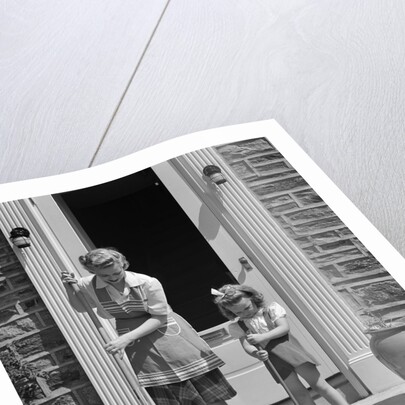 1940s Mother And Daughter Sweeping Sidewalk In Front Of Home by Anonymous