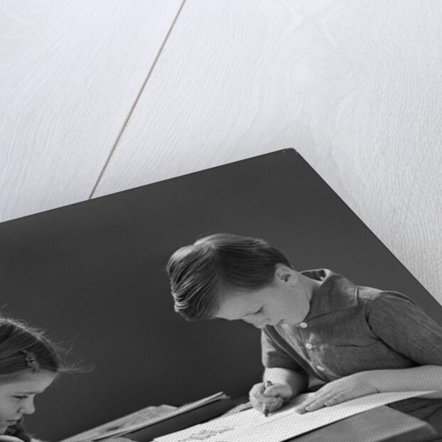 1940s Boy And Girl Sitting At Table Coloring In Books by Anonymous