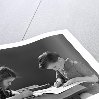 1940s Boy And Girl Sitting At Table Coloring In Books by Anonymous