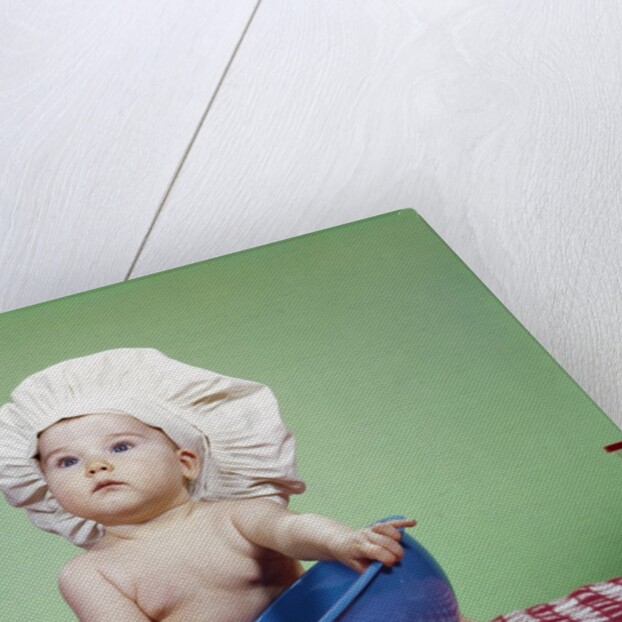 1960s Serious Baby In Chef Hat With Mixing Bowl And Spoon by Anonymous