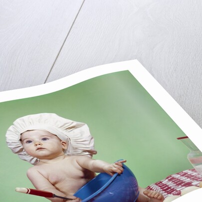 1960s Serious Baby In Chef Hat With Mixing Bowl And Spoon by Anonymous