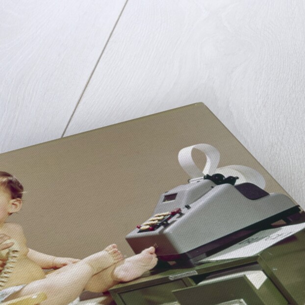 1960s Business Baby Sitting In Chair Holding Telephone With Calculator Adding Machine File Drawers Looking Back Over Shoulder by Anonymous