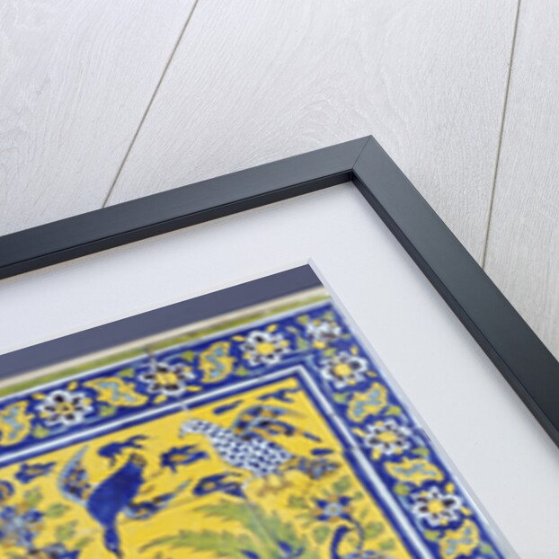 A Qajar cuerda seca tile panel comprising twenty tiles by Anonymous