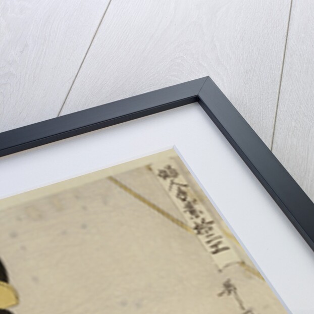 A half-length portrait of two women, one seated at a loom and the other showing a roll of black and white checkered cloth by Kitagawa Utamaro