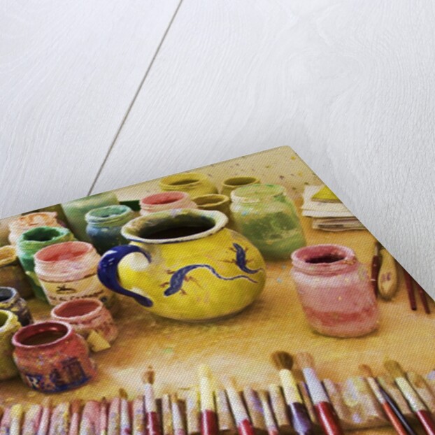 Paint brushes and colored paints by Anonymous