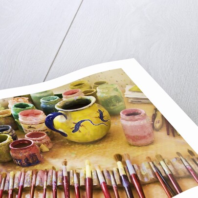 Paint brushes and colored paints by Anonymous