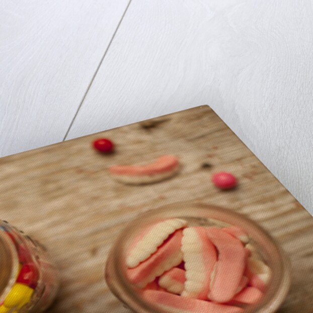 Bubble gum balls and teeth candy in mason jars by Anonymous