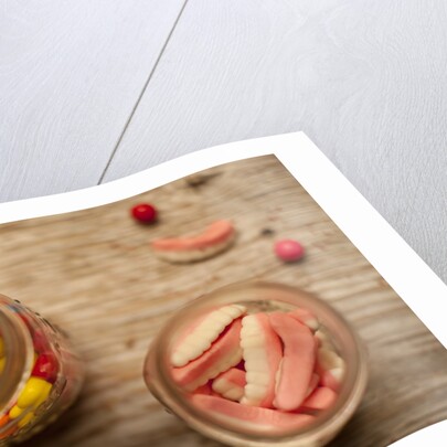 Bubble gum balls and teeth candy in mason jars by Anonymous