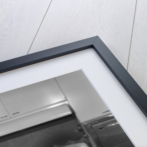 1950s mother and daughter baking a cake by Anonymous