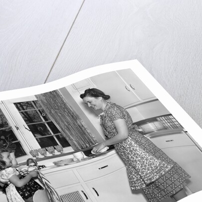 1930s 1940s mother and daughter washing dishes by Anonymous