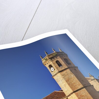 Clock tower of the San Mateo Church in Banos de la Encina, Spain by Anonymous