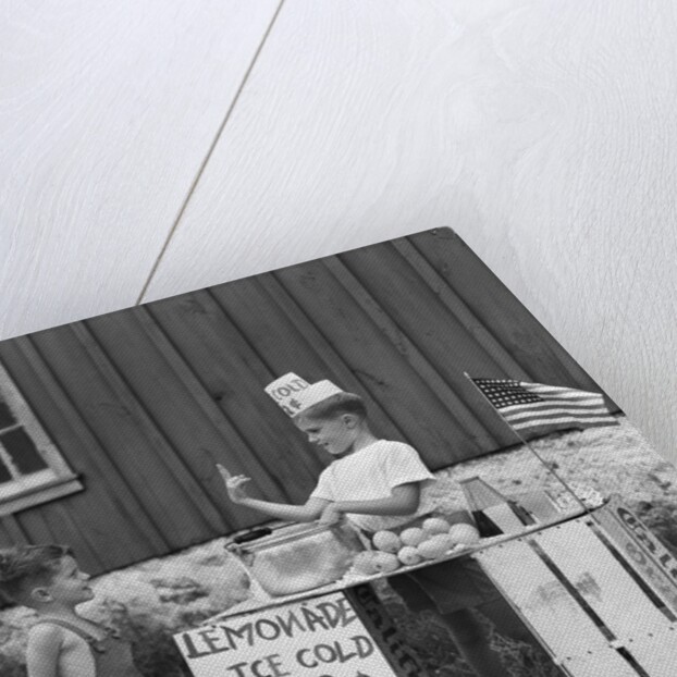 1940s boy running lemonade stand by Anonymous