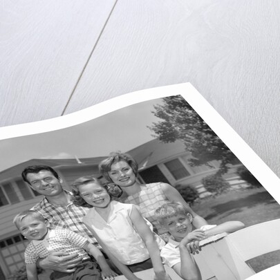 1960s family portrait in front of horse by Anonymous