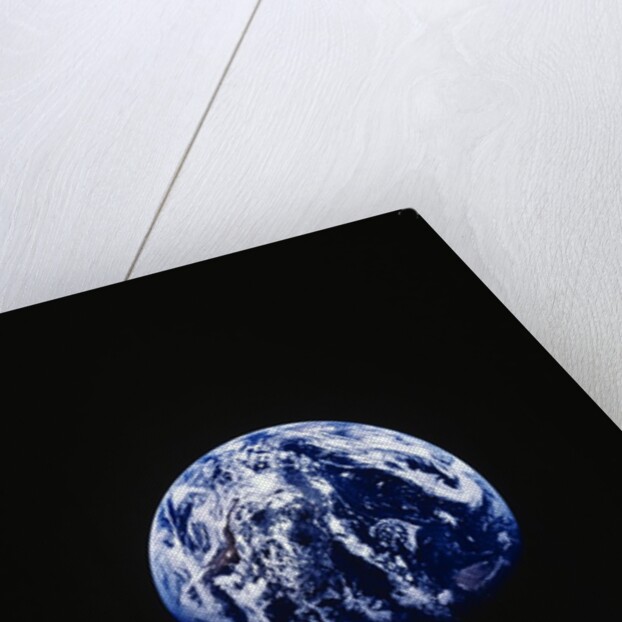 Earth and clock face at 11:57 by Anonymous