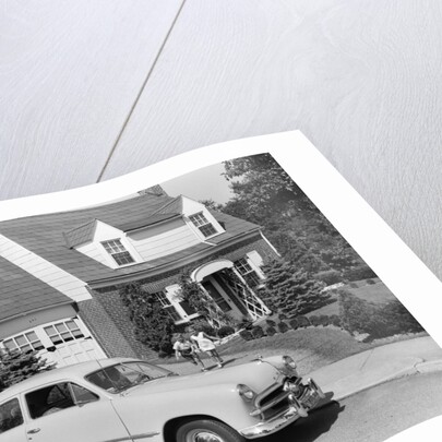 1950s children running towards father sitting in a car by Anonymous