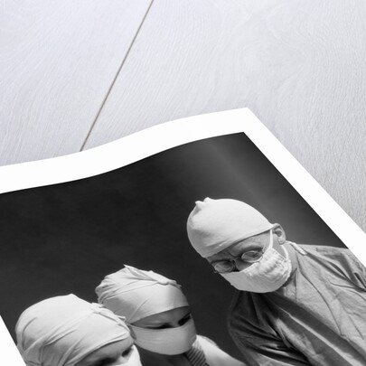 1920s 1930s doctor and two nurses wearing surgical masks by Anonymous
