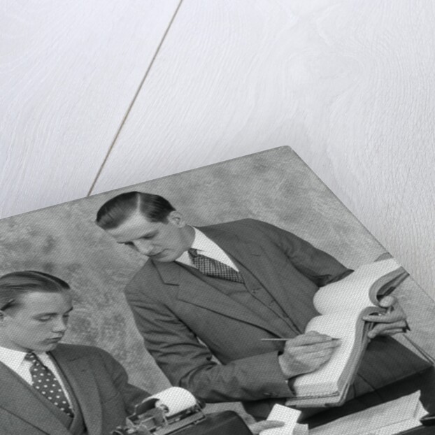 1920s bookkeeper and young assistant by Anonymous