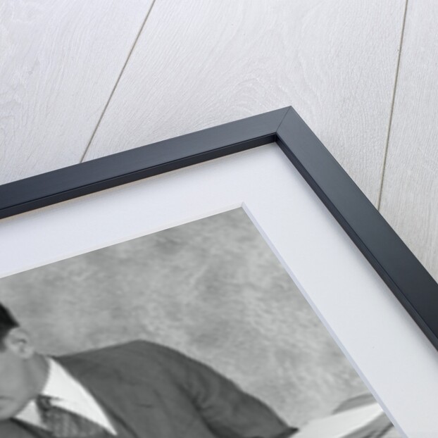 1920s bookkeeper and young assistant by Anonymous