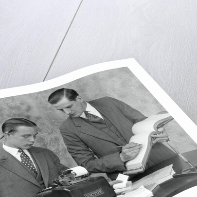 1920s bookkeeper and young assistant by Anonymous